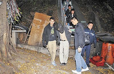 港竊賊鑿穿大廈墻壁僅偷300元藏匿山洞遭圍捕